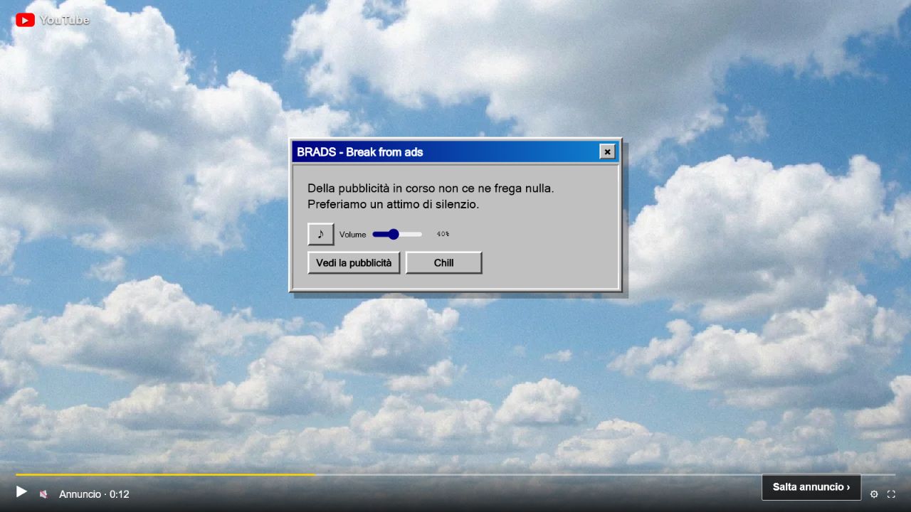 BRADS mostra una finestra in stile Windows 98 sopra uno sfondo di nuvole durante una pubblicità YouTube